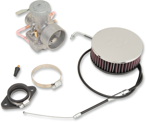 A completed Mikuni 38mm carburetor kit displayed, including the carburetor, air cleaner, hose clamps, and throttle cable, with various components visible.