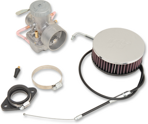 A completed Mikuni 38mm carburetor kit displayed, including the carburetor, air cleaner, hose clamps, and throttle cable, with various components visible.